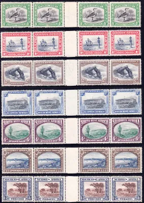 South West Africa 1931 Pictorial definitive (perf. up). ½d to 1s, horizontal strips of four across the inter panneau margin. Very fine, unused without gum. MNH (**) South West Africa 1931 Pictorial definitive (perf. up). ½d to 1s, horizontal strips of four across the inter panneau margin. Very fine, unused without gum. MNH (**)