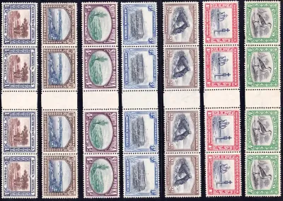 South West Africa 1931 Pictorial definitive (perf. up). ½d to 1s, horizontal strips of four across the inter panneau margin. Very fine, unused without gum. MNH (**) South West Africa 1931 Pictorial definitive (perf. up). ½d to 1s, horizontal strips of four across the inter panneau margin. Very fine, unused without gum. MNH (**)