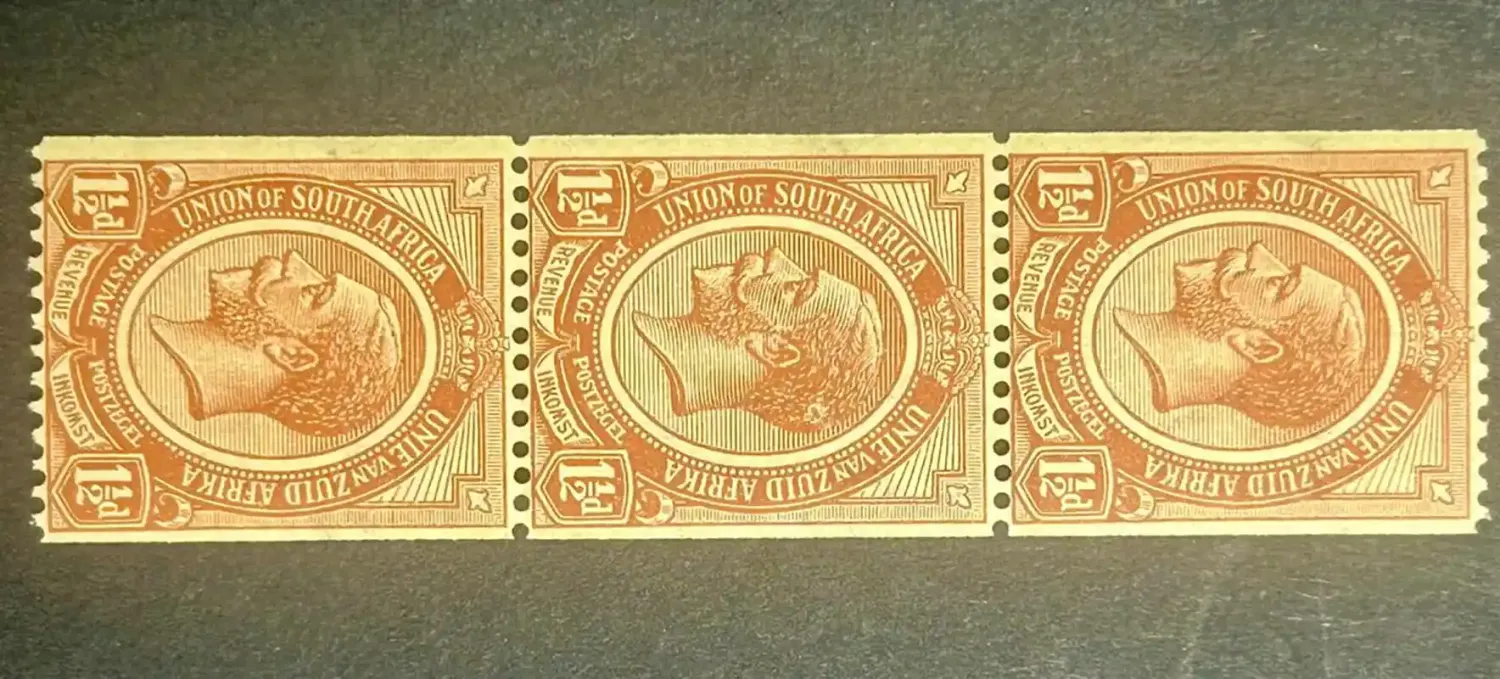 South Africa 1913 KGV Kings Heads Coil stamps, 1½d chestnut strip of three. MNH(**) South Africa 1913 KGV Kings Heads Coil stamps, 1½d chestnut strip of three. MNH(**)