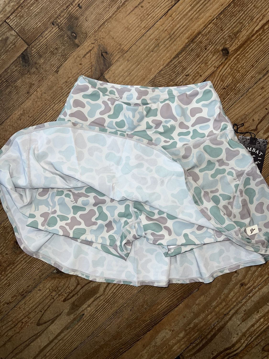 Women's EXCLUSIVE Front Line Committed Camo Skort