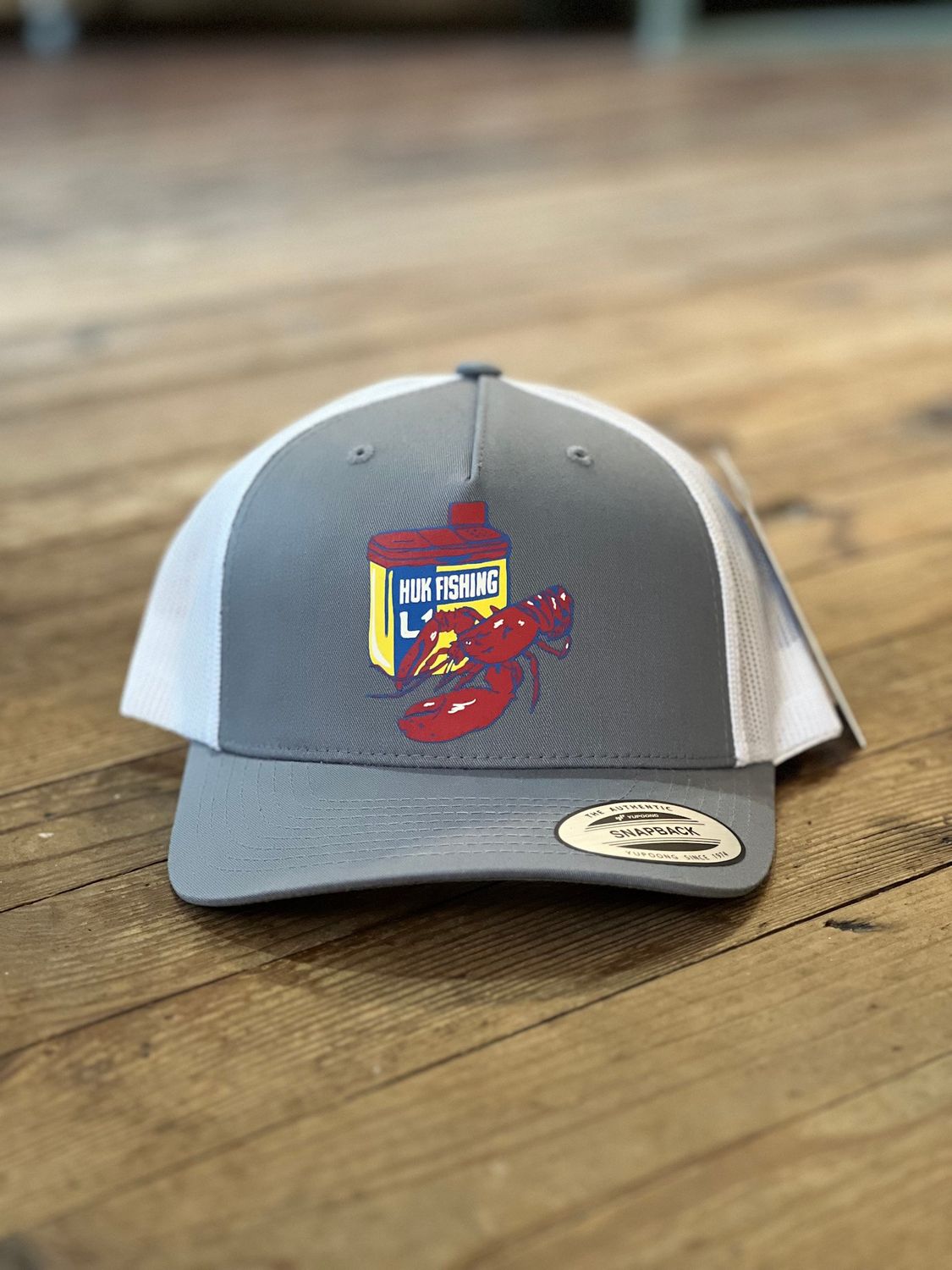 HUK Graphic Trucker Hat Night Owl