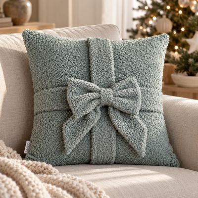MAVO GIFT – Poduszka bouclé z ozdobną kokardą