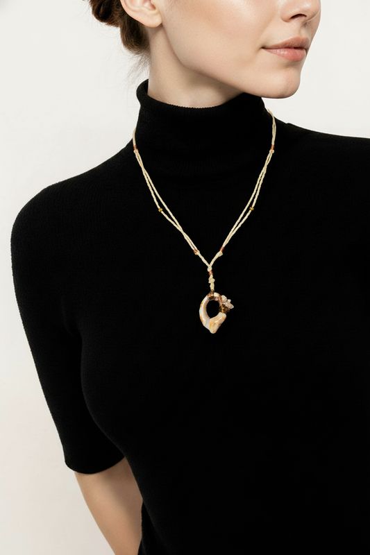 Wire Wrapped Fractured Murex on cord