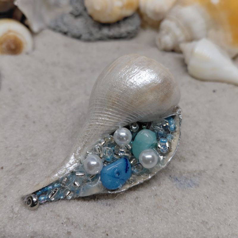 Pear Whelk Magnet Filled with ocean hued beads