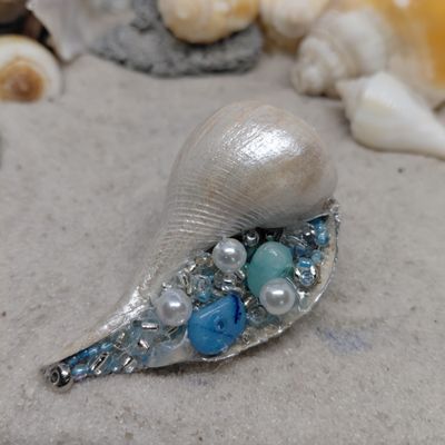 Pear Whelk Magnet Filled with ocean hued beads