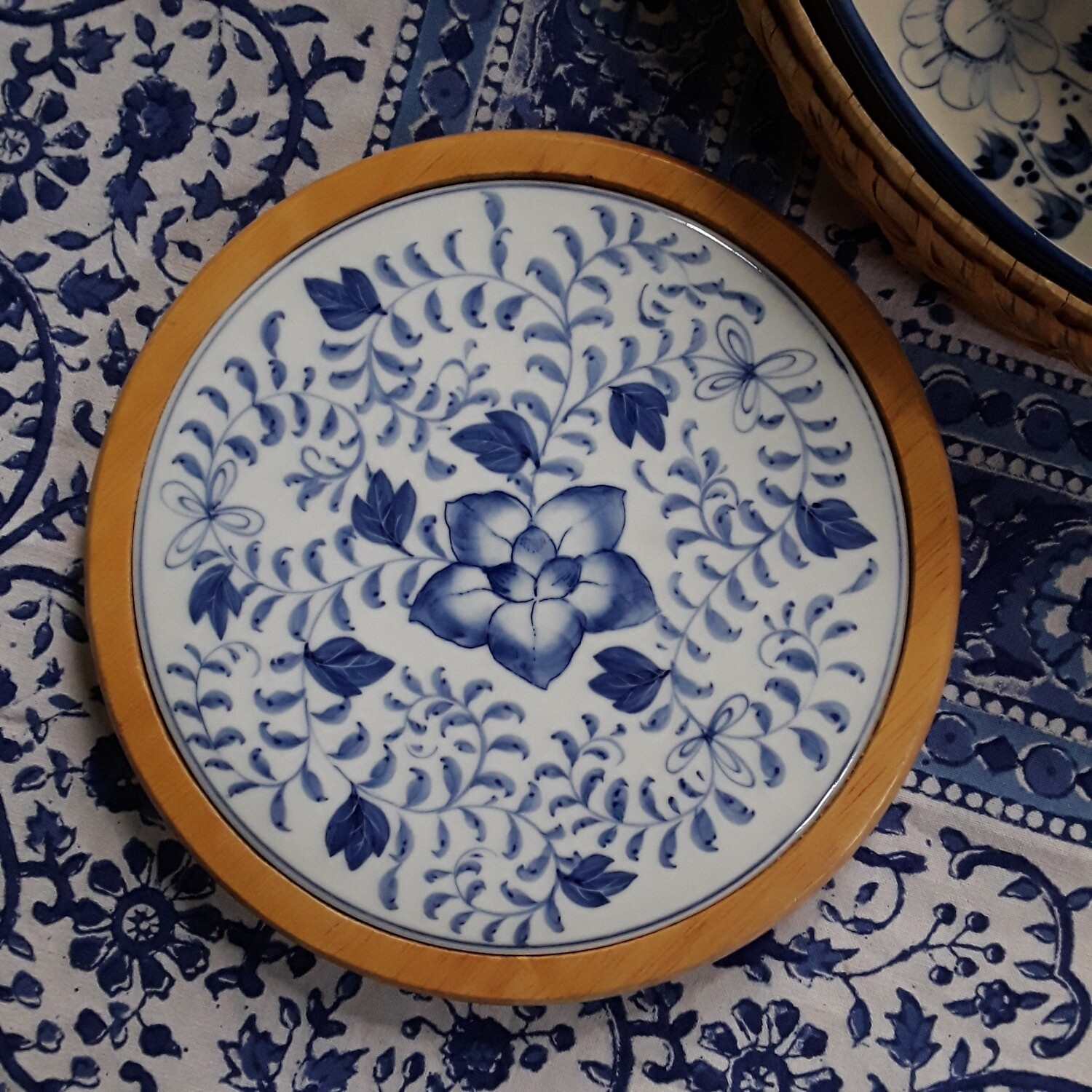 Vintage Blue and White Porcelain and Wood Trivet
