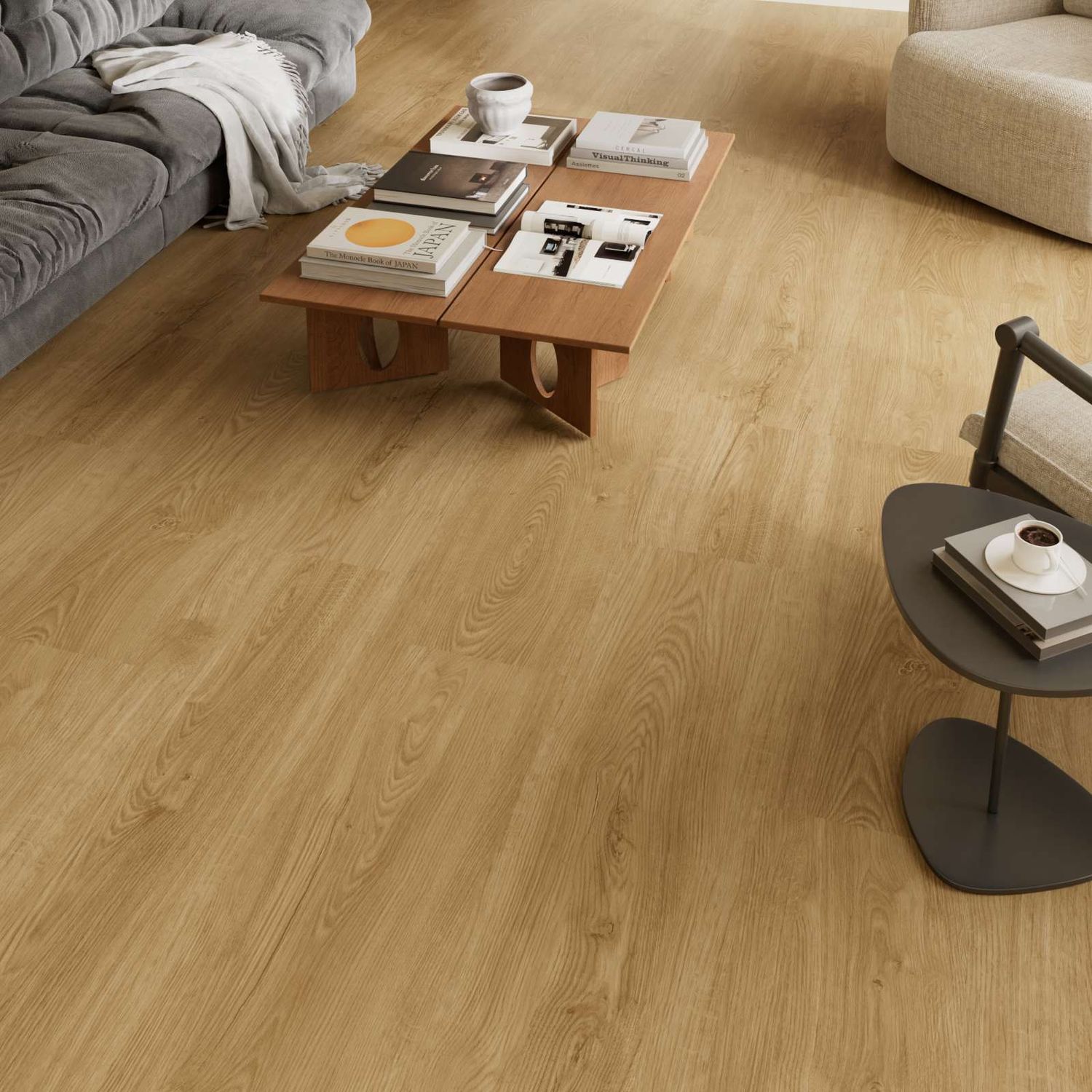 Klick-Vinyl in hellbrauner Holzoptik in einem Wohnzimmer. Eiche Perlgold
