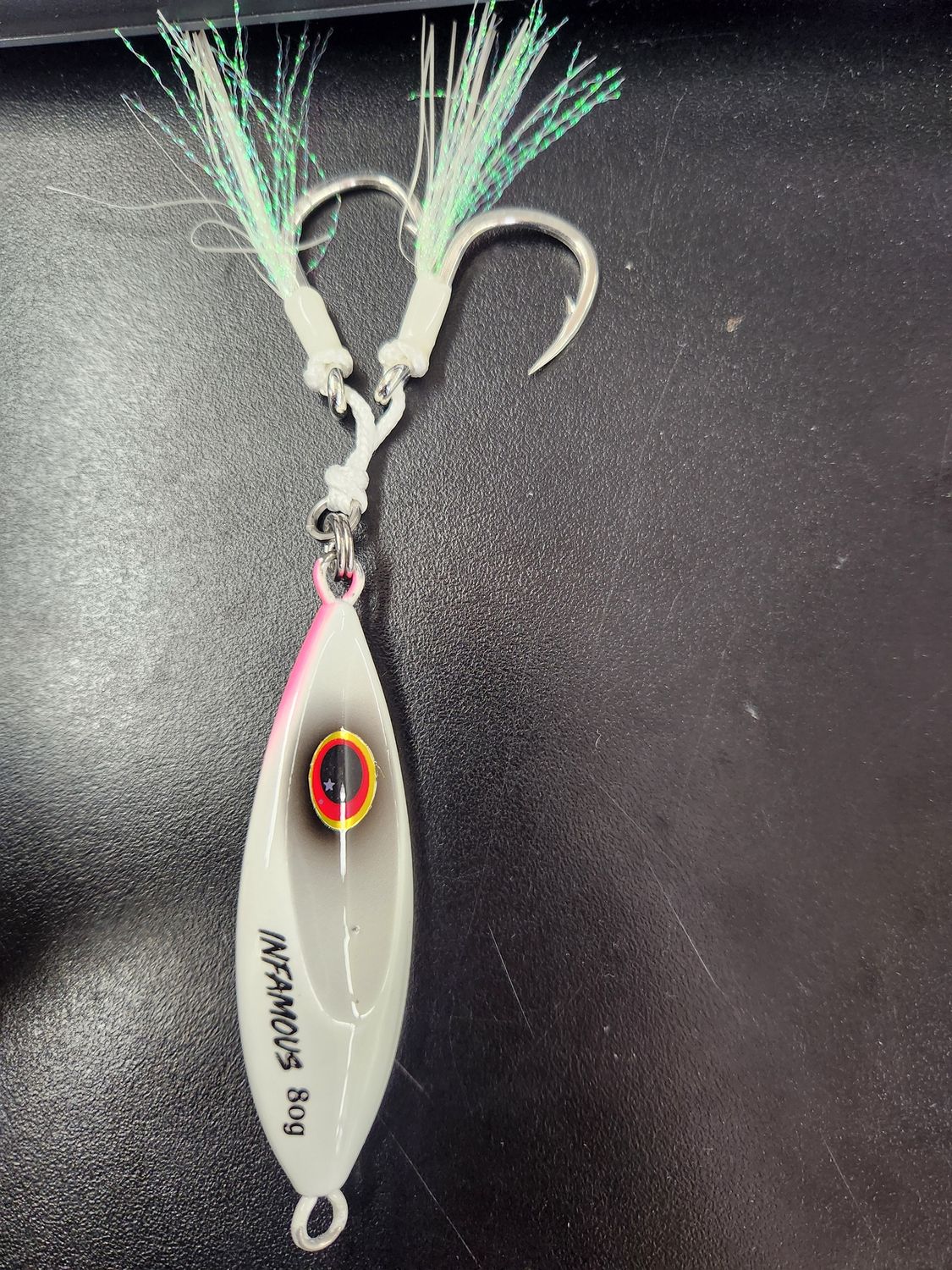 Infamous Tackle Tide Jig, Color: White Glow, Size: 60 Grams