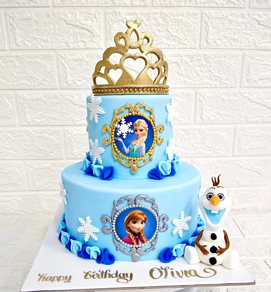 2 tier Frozen theme birthday cake with handmade model of Olaf and Elsas  crown  Fairy birthday cake Frozen birthday cake Tiered cakes birthday