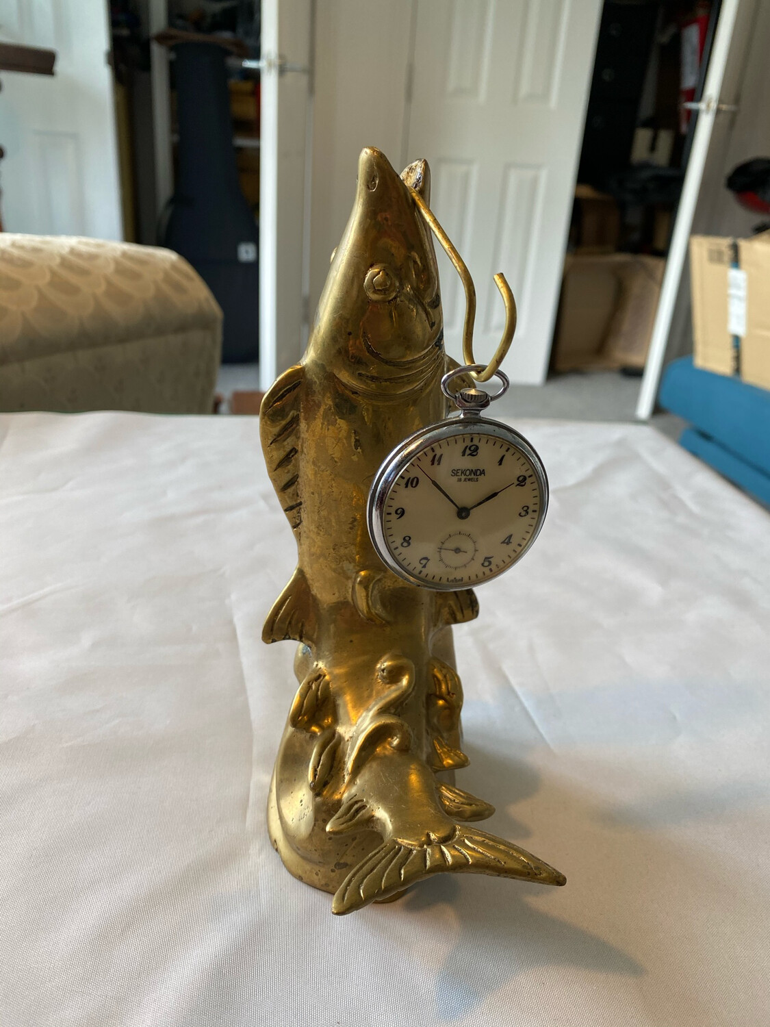 Brass pocket watch stand in style of fish - watch not included