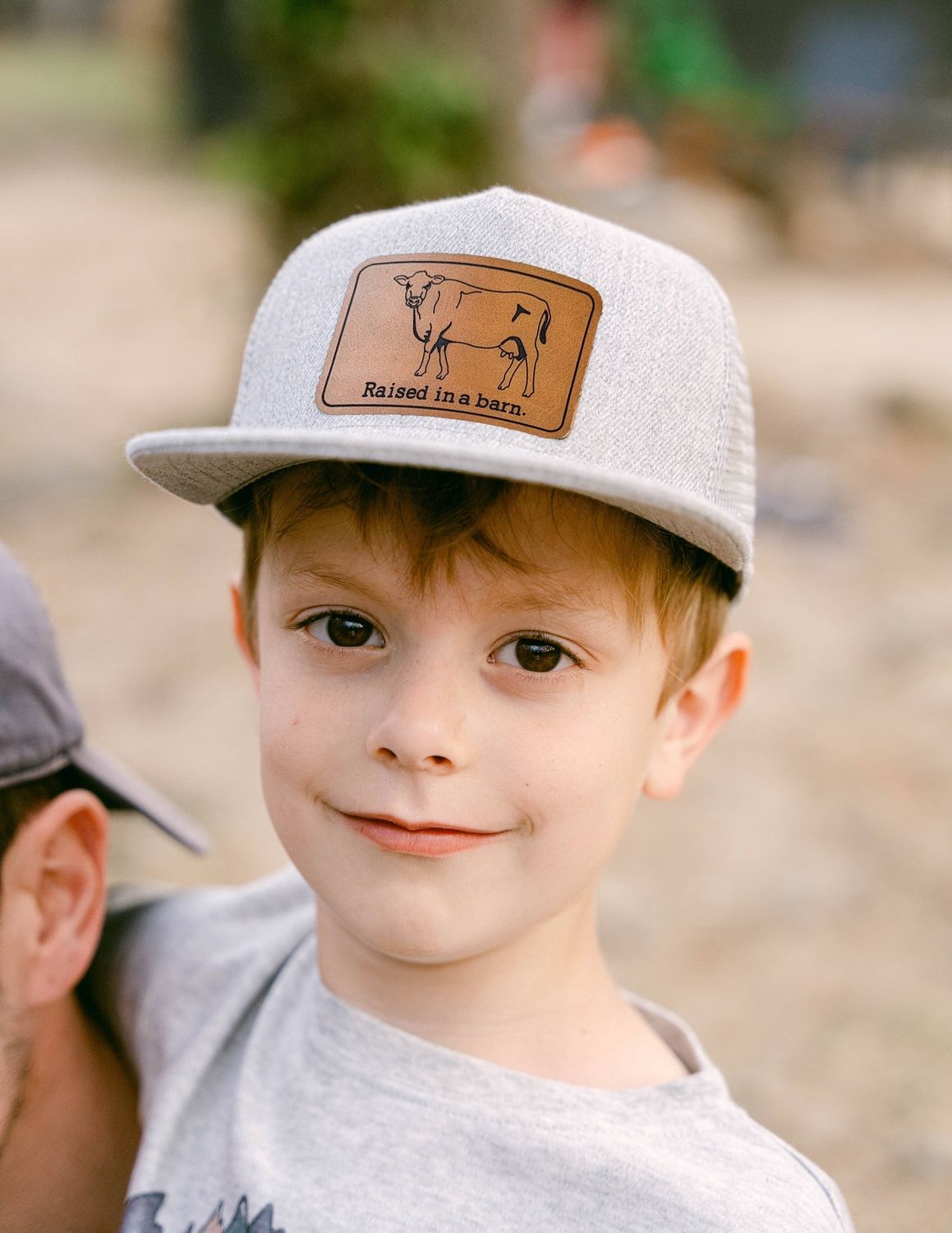 Raised in a barn Cow Country Western Farm Kids Trucker Hat
