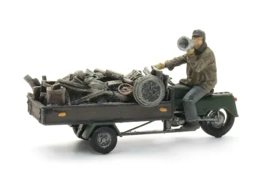 Bakbrommer met lading ijzerboer