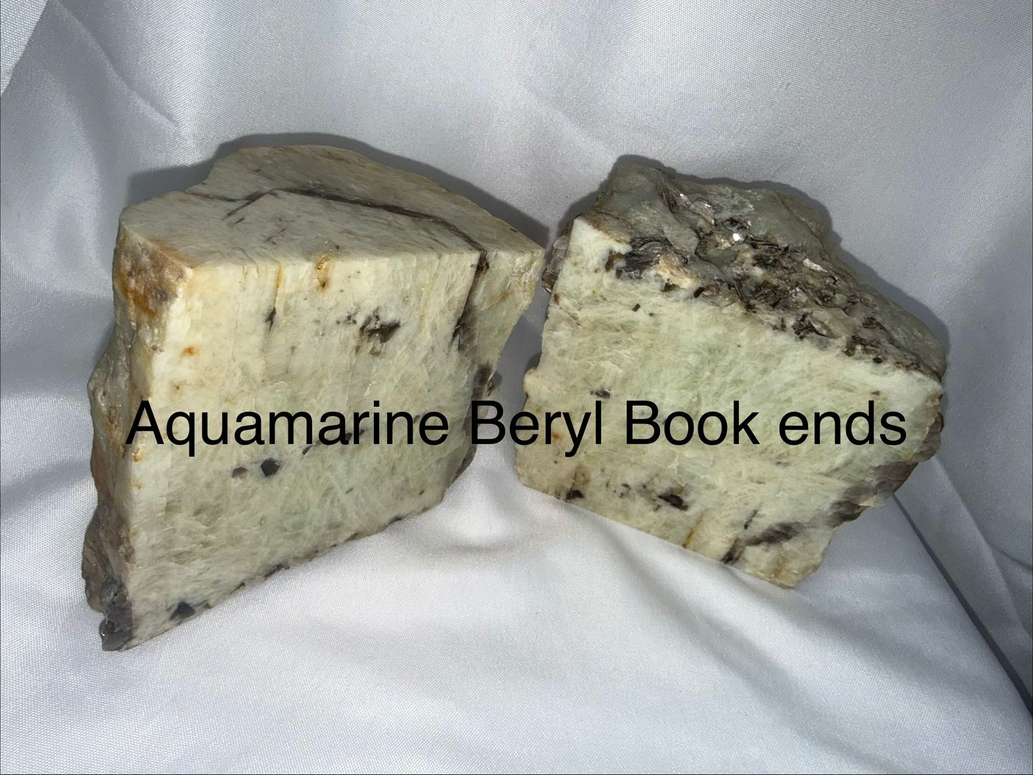 Aquamarine beryl book ends with silver bands