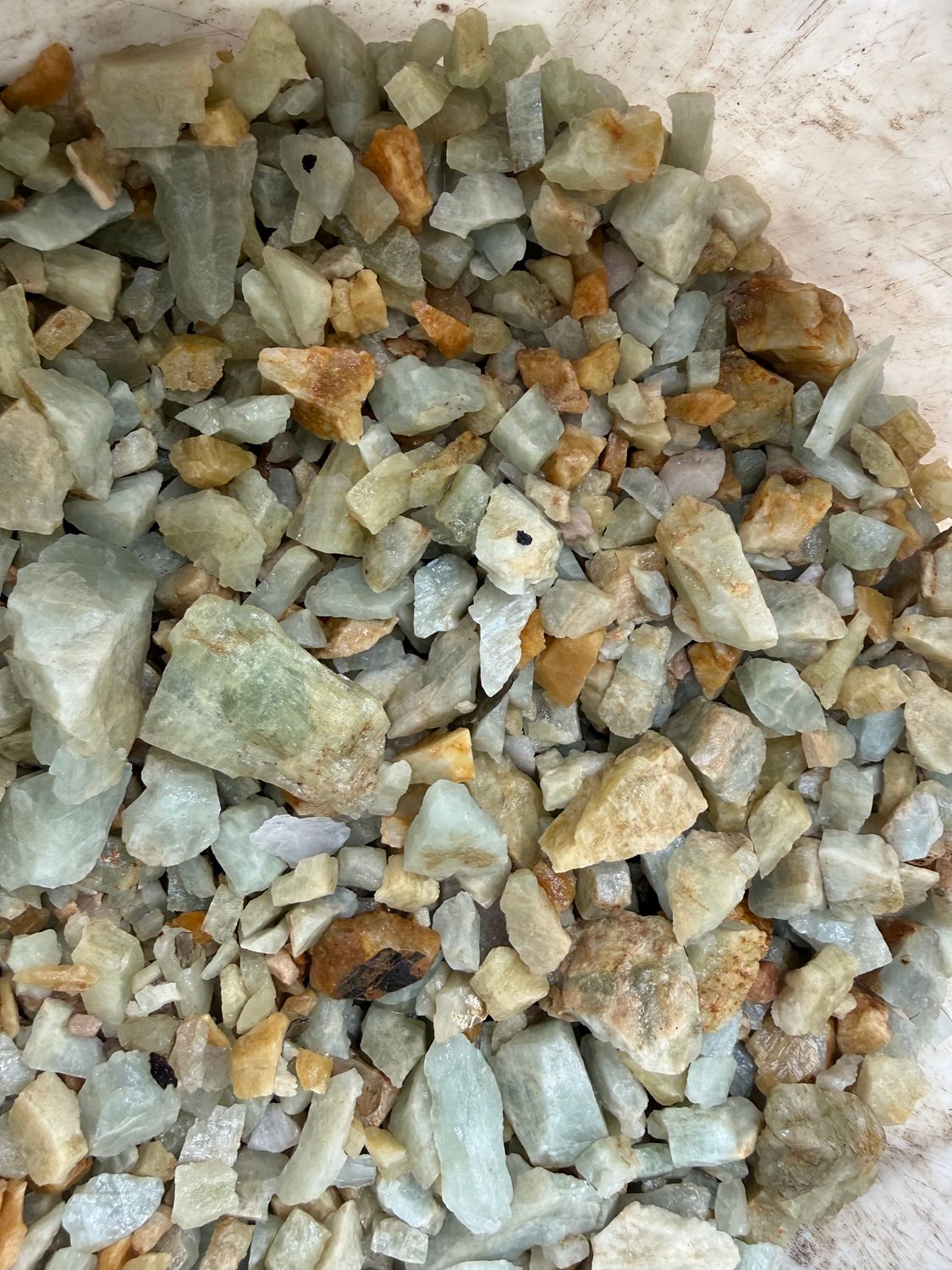 Raw green, yellow and aquamarine Beryl