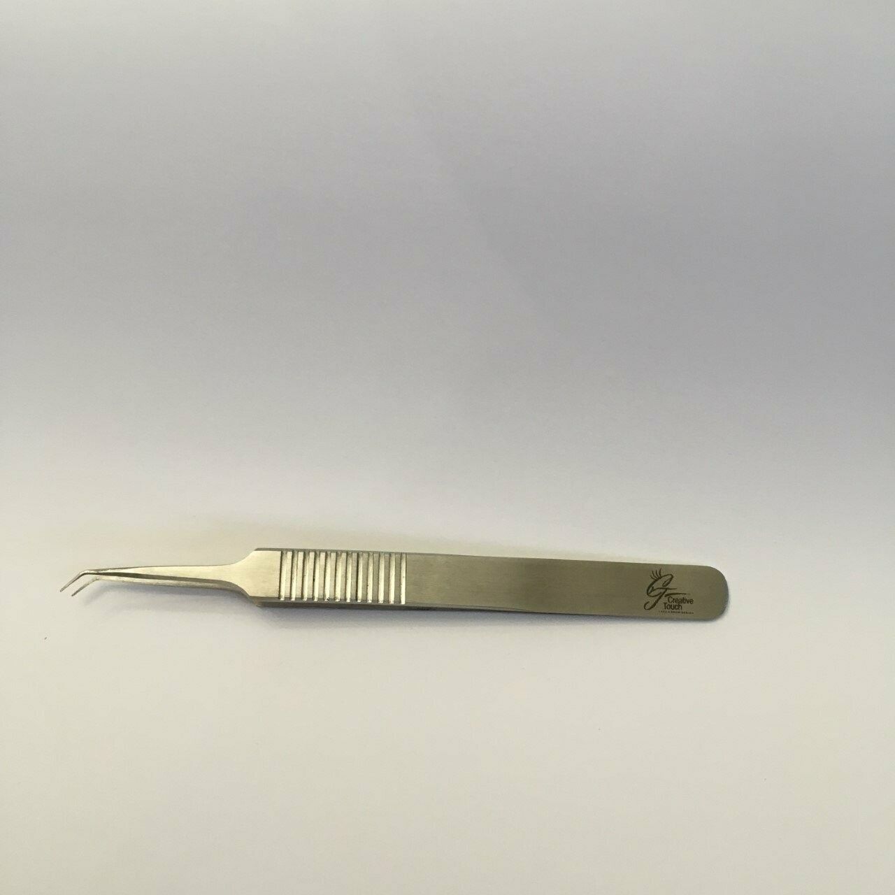 Short angled tweezers