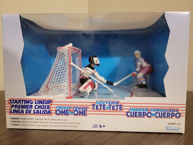 Hasek-Gretzky Freeze Frame (French, Spanish)