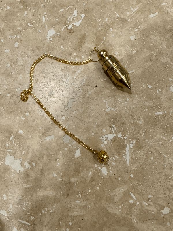 Pendule secret doré