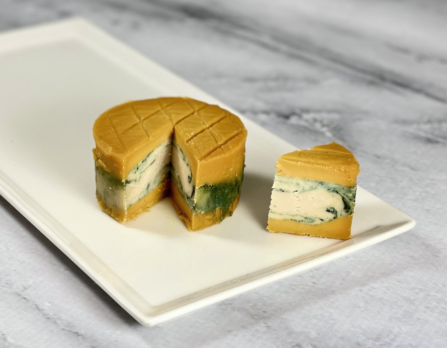 THE PLANTSMAN limited release layered Spirulina & Sharp Cheddar Vegan Cheese