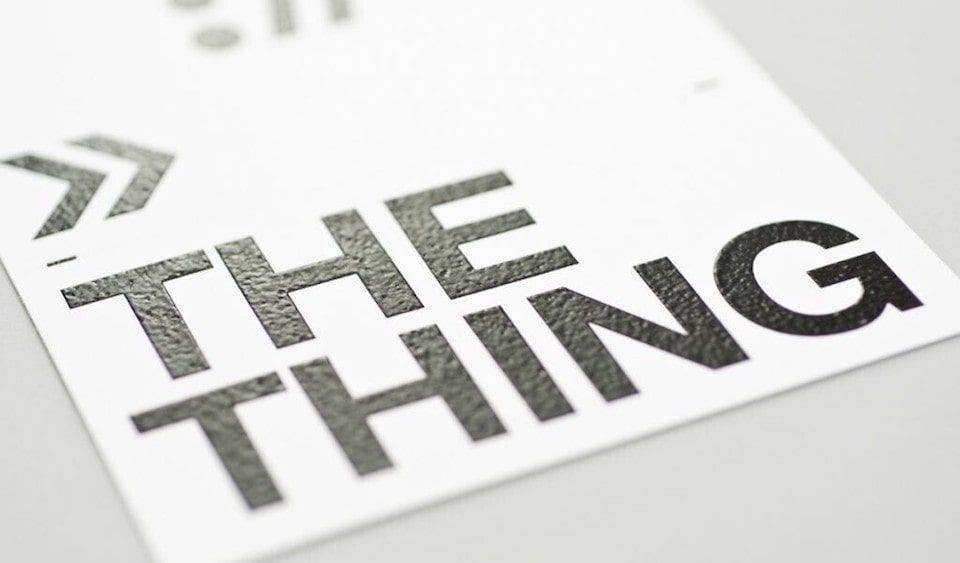 Raised print vellum business cards with smooth finish on uncoated 12pt stock