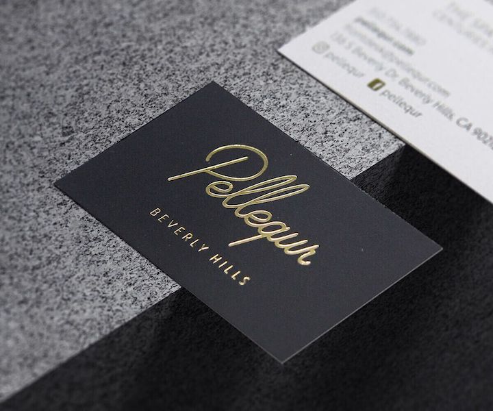 Foil pressed business cards with metallic accents on 14pt or 32pt uncoated stock