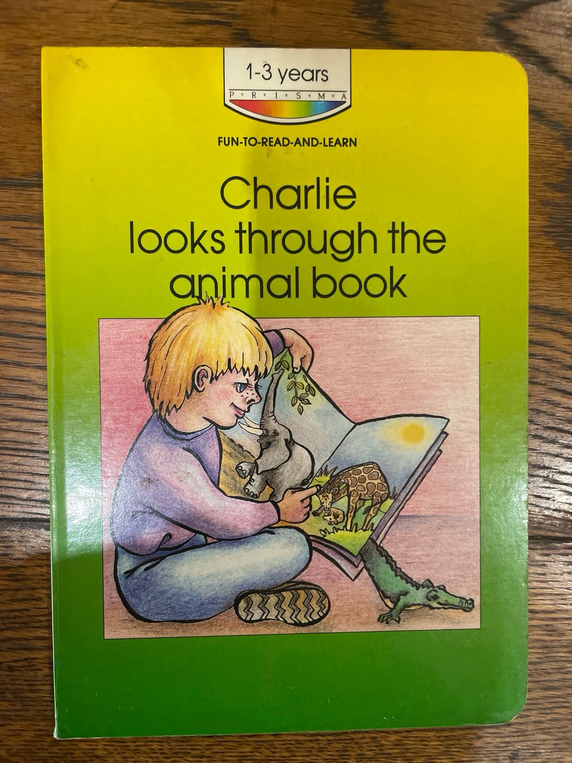 Charlie Looks Through The Animal Book