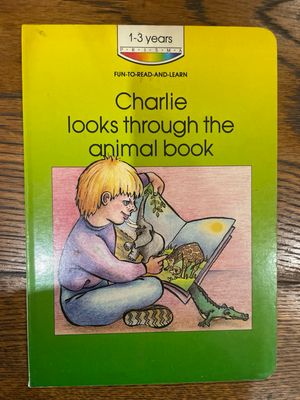 Charlie Looks Through The Animal Book