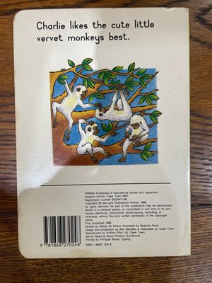 Charlie Looks Through The Animal Book