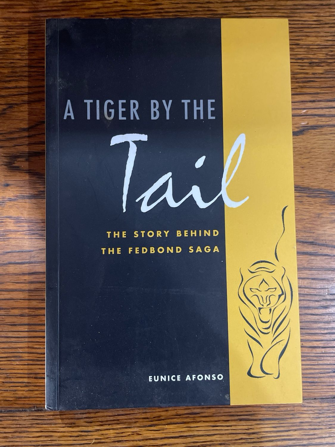 A Tiger By The Tail- The Story Behind The Fedbond Saga by Eunice Afonso