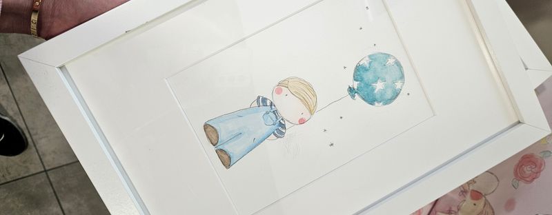 Boy holding balloon framed painting Boy holding balloon framed painting