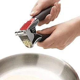Garlic Press with Built-In Cleaner