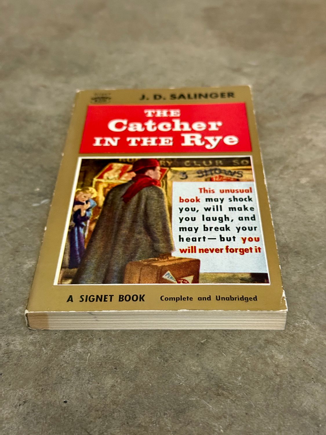 The Catcher in the Rye by J. D. Salinger (Signet D1667, 20th Printing, February 1962)