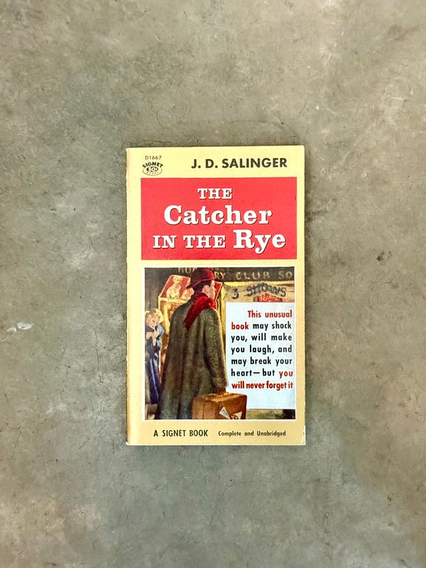 The Catcher in the Rye by J. D. Salinger (Signet D1667, 20th Printing, February 1962)