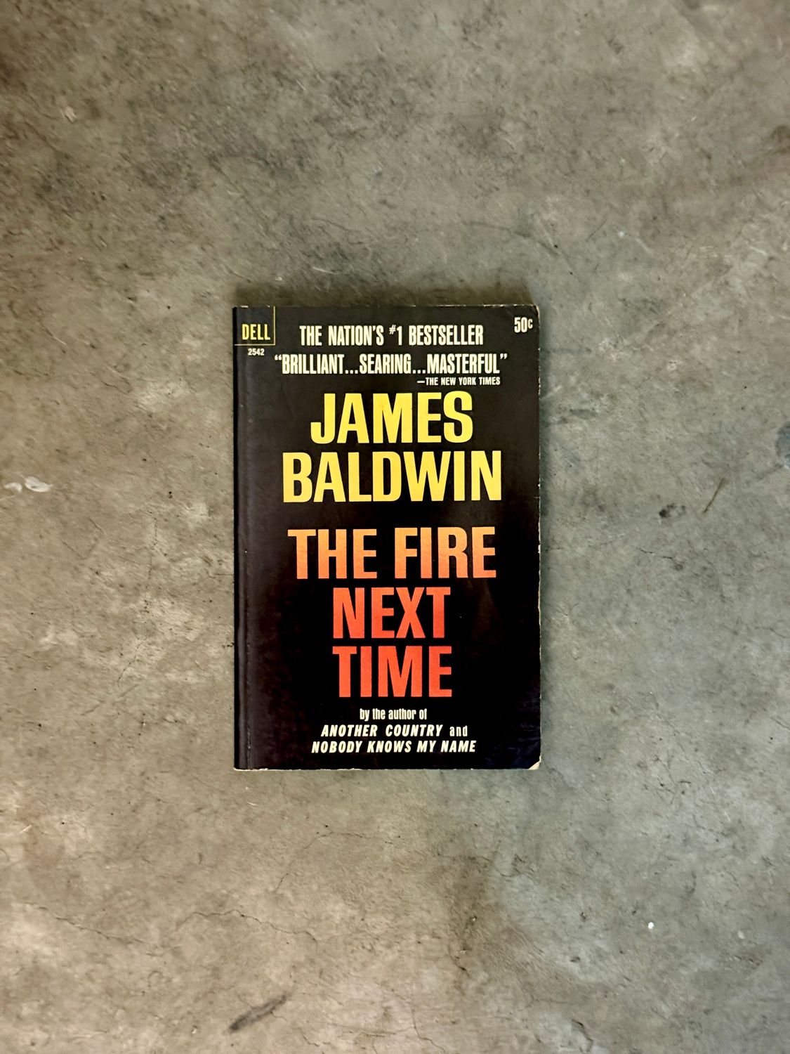 The Fire Next Time by James Baldwin (First Dell Paperback Printing, 1964)