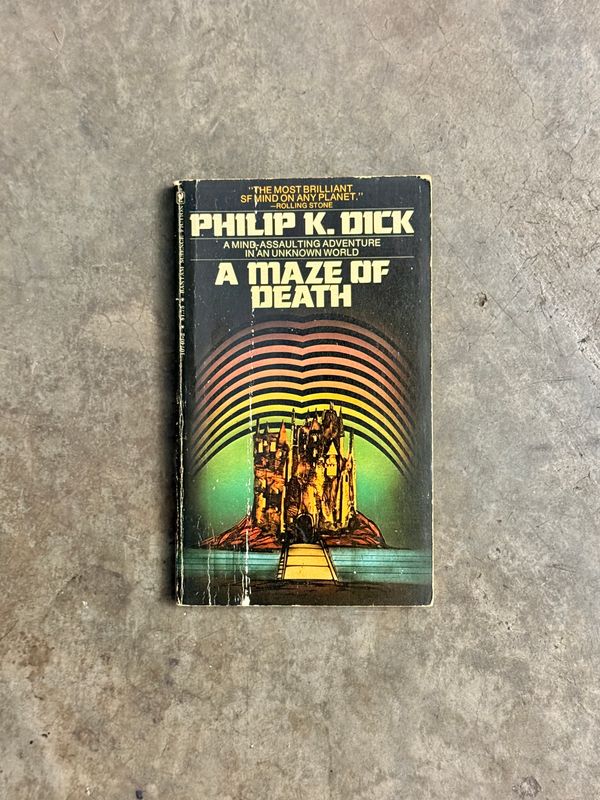 A Maze of Death by Philip K. Dick (1977 Bantam Paperback Edition, First Printing)