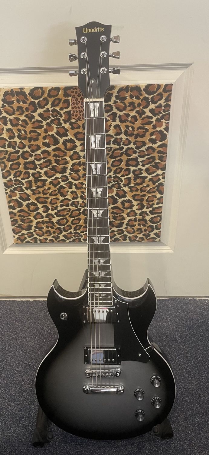 Woodrite Warlord  guitar- silver