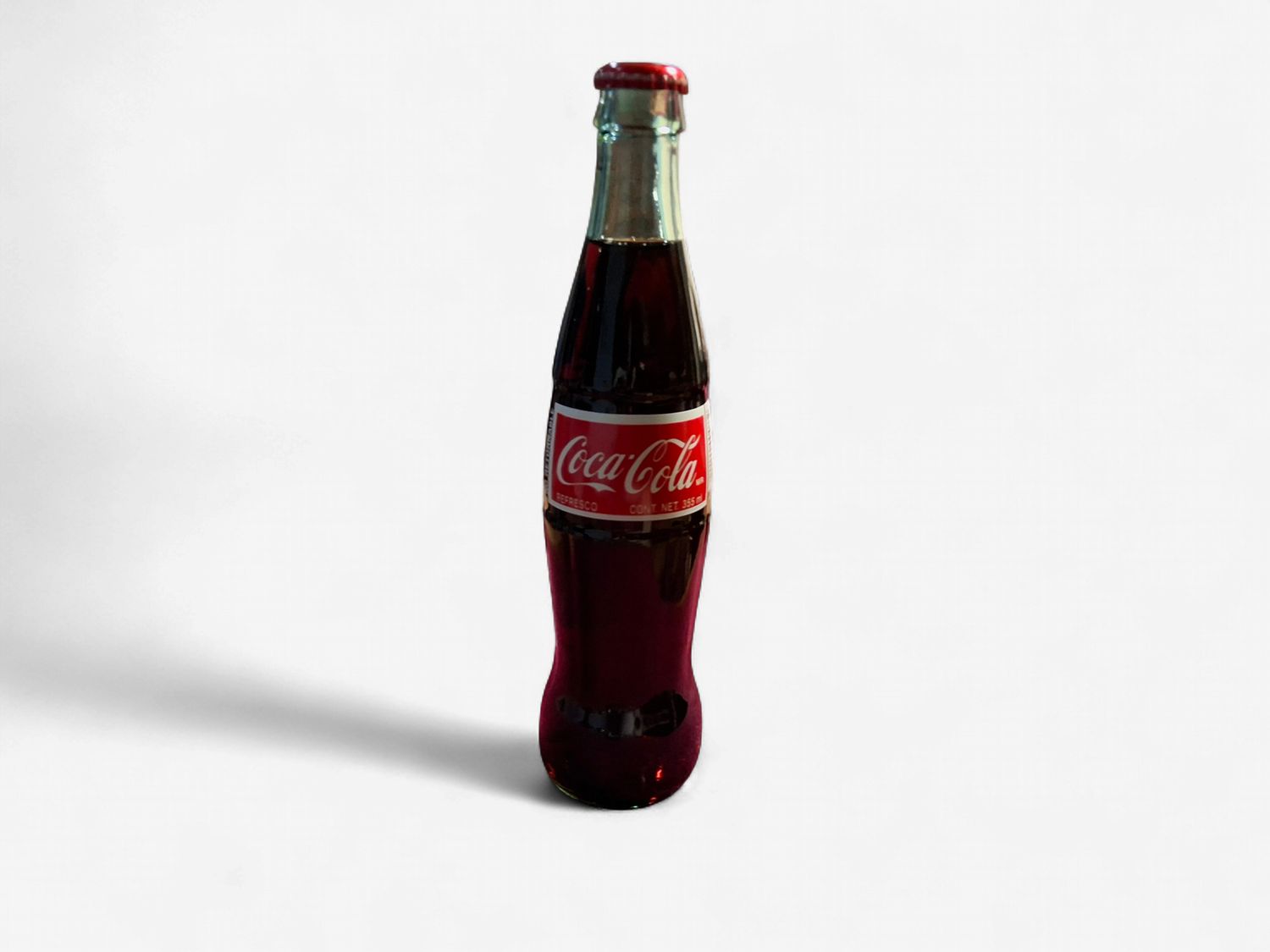 Coca-cola. 12oz. Bottle