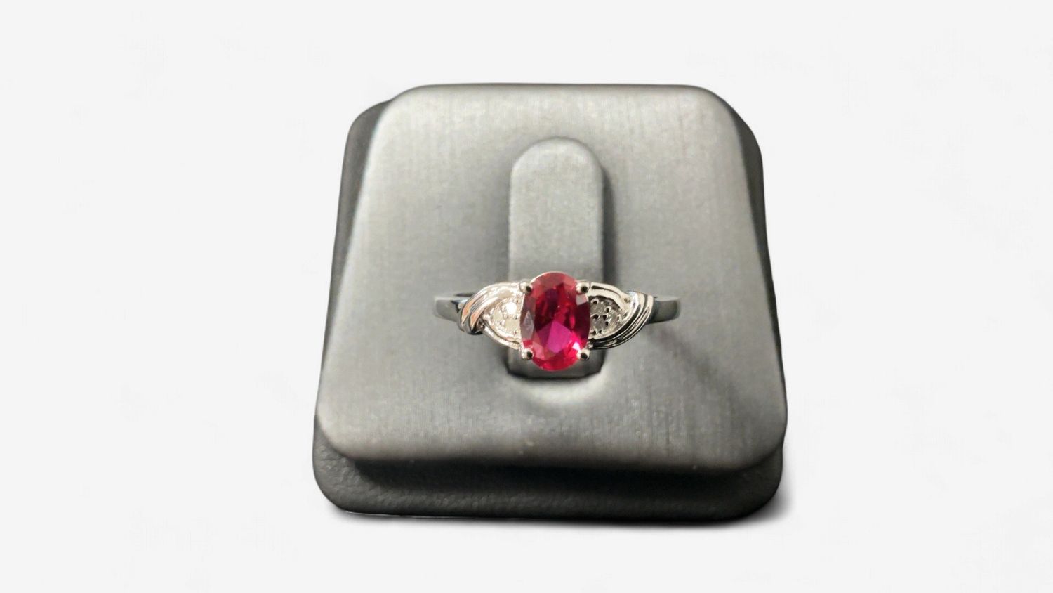 Sterling Silver Oval Shaped Created Ruby and Diamond Ring