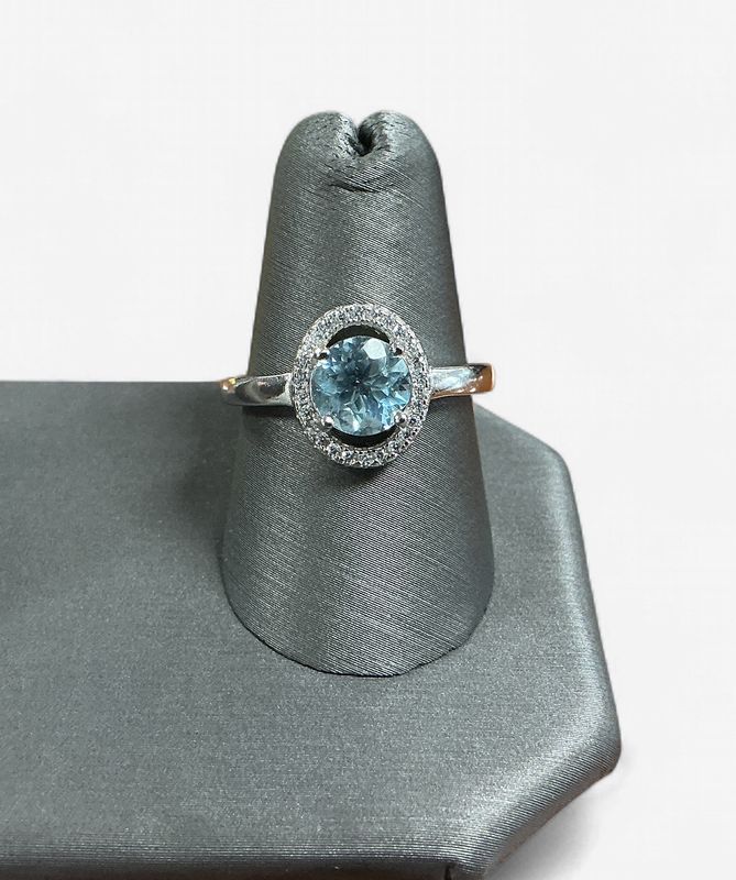 Sterling Silver Round Blue Topaz and CZ accented Ring