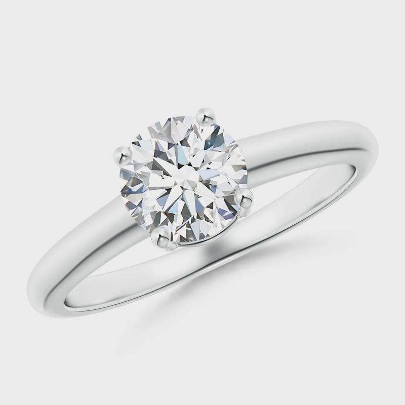 Previously Loved 1 ct Round Natural Diamond Solitaire Ring set in 14k White Gold