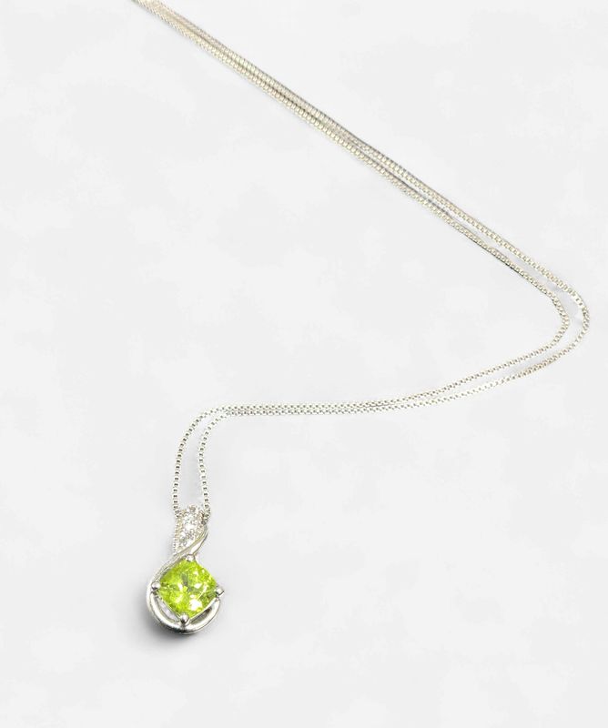 Peridot Necklace Quarter turned with small rnd white topaz stones