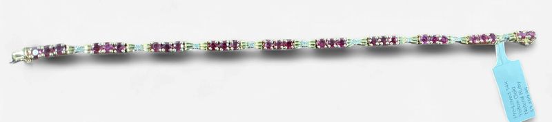 Pre-Loved 14k Yellow Gold Natural Ruby and Diamond Fashion Bracelet