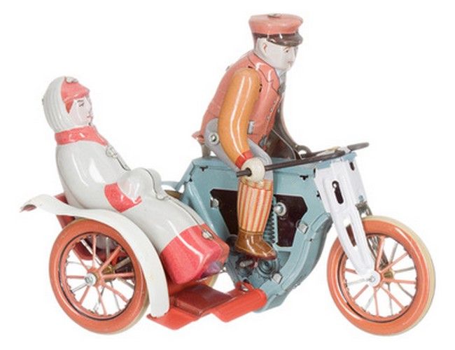 Motorfiets met dame in zijspan