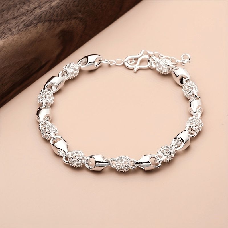 Silver Plated Luxury Oval Carved Hollow Bead Bracelet