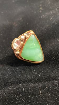 Chrysoprase and dichroic glass with copper, brass, and silver bezel