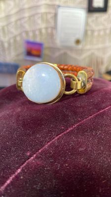 Moonstone with copper and brass bezel and woven leather bracelet