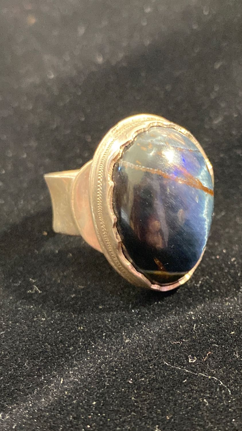 Oblong Tigers Eye Ring with Free Form Silver Bezel