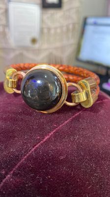 Black Onyx, with copper and brass bezel and braided leather bracelet