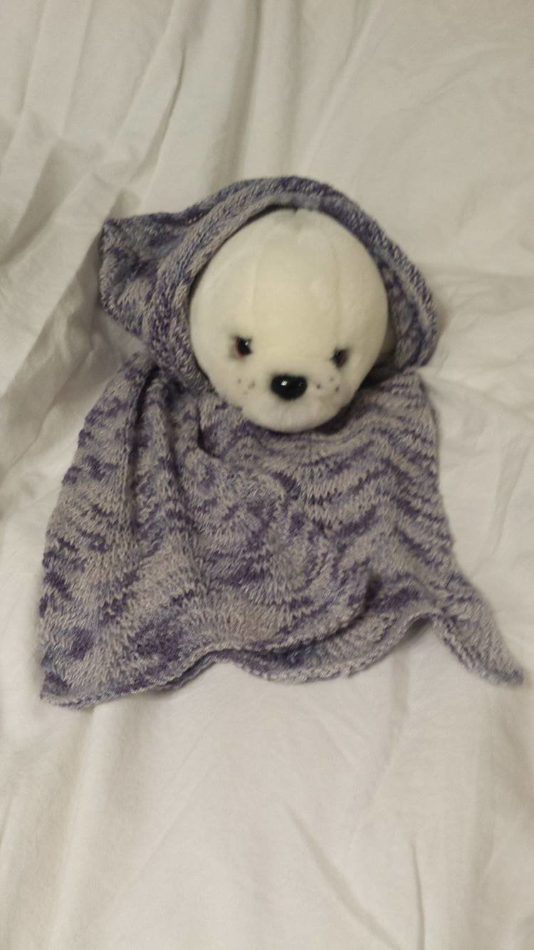 Sleak, soft, finely stitched scarf