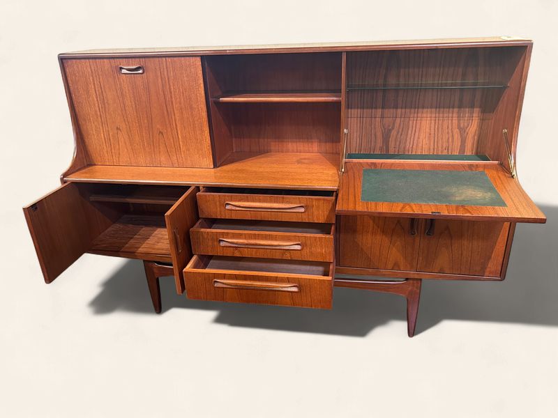 E77 - MCM Teak Sideboard features drop desk / storage + open display