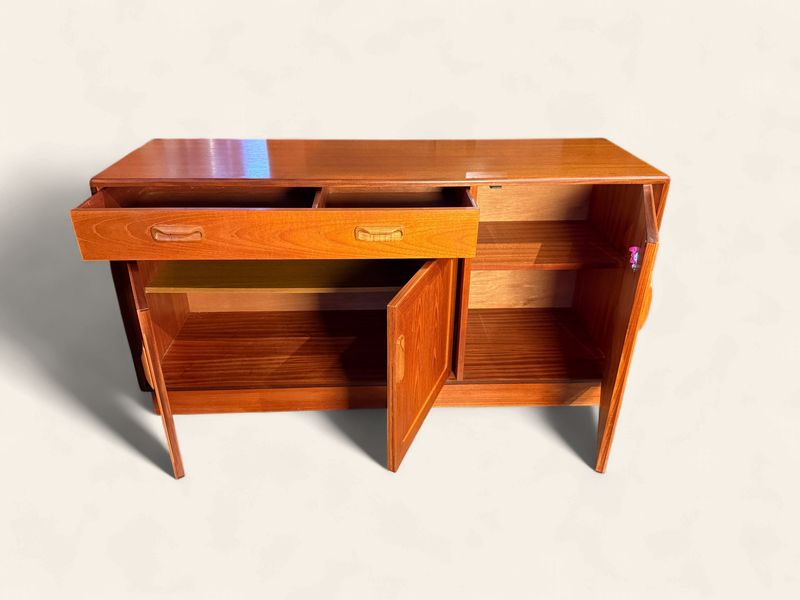 E169 - MCM Teak Console with sculpted, 1 drawer over two door & full side door
